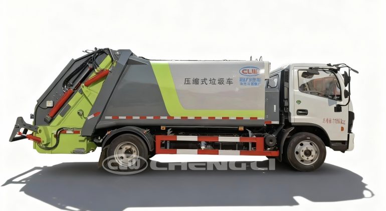 Small garbage compactor truck side view
